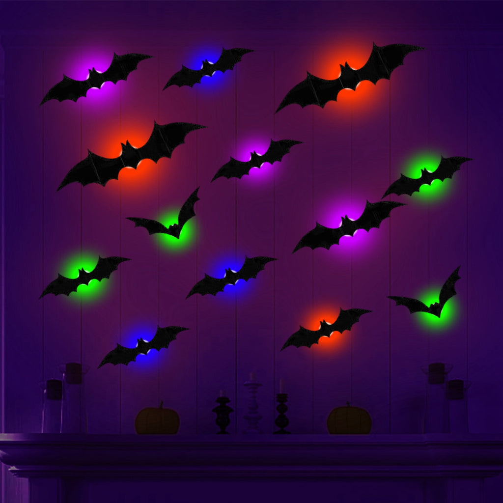 Décoration Halloween chauve-souris LED allumées sur un mur