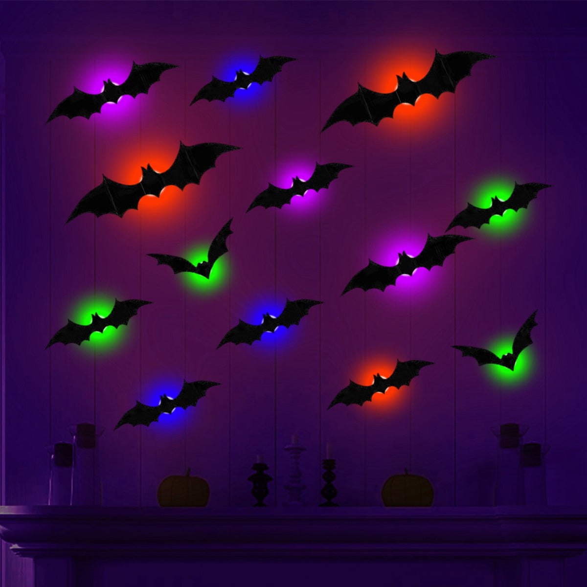 Décoration Halloween chauve-souris LED allumées sur un mur